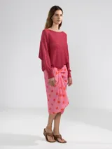 Sweater tejido en jersey con lurex, escote bote y detalle de tigre insignia de Polonio en la espalda.