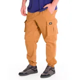 Pantalón cargo color arena de corte slim, con bolsillos laterales con solapa y puños elásticos.