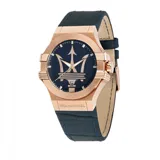 Reloj Maserati Potenza con caja de acero color oro rosa, esfera azul con el logo de la marca, correa de cuero azul con textura y cierre de hebilla. Resistente al agua hasta 100 metros.