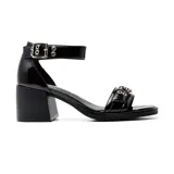 Sandalias negras de cuero sintético con taco bajo cuadrado y hebillas plateadas.