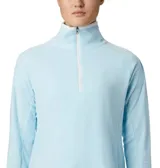 Buzo polar blanco de mujer, con cuello alto y cierre de media cremallera.