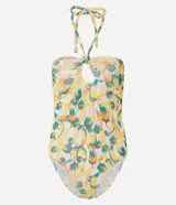 Body femenino con estampado de bananas en tonos amarillo, naranja y verde. Diseño de frente única con lazo anudado en el centro del busto que genera un corte tipo ojal.