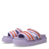 Sandalias de plataforma color beige con tiras acolchadas y detalle de ribete fucsia.