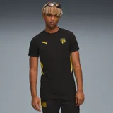 Remera deportiva Puma Evostripe Tee negra con detalles en amarillo en los laterales, logo de Puma bordado en amarillo en el pecho y escudo del Club Atlético Peñarol bordado en el pecho. Corte clásico y cuello redondo.