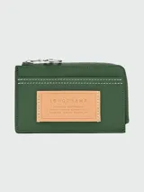 Tarjetero Longchamp Le Pliage Xtra Worker color verde oscuro con cierre superior de cremallera y múltiples ranuras para tarjetas.