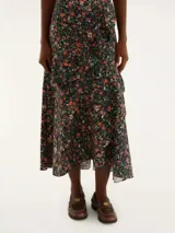 Falda midi de algodón con estampado floral multicolor, cintura ajustada y corte evasé.