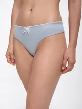 Colaless de algodón color negro con ribete blanco y moño blanco en el frente.