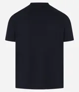 Remera slim de manga corta color salmón, de punto medio, sin estampado y cuello redondo.