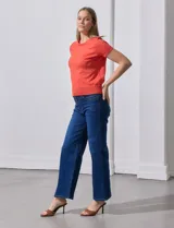 Buzo blanco tejido en hilado fino, marca Ninety.