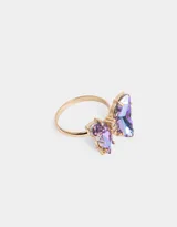 Anillo dorado con dos mariposas de strass tornasol.