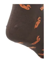 Calcetines tobilleros color marrón con estampado de patos color naranja.