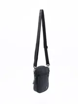 Morral bandolera negro con cierre superior y bolsillo frontal con cierre.