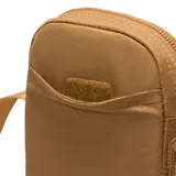 Riñonera Nike Heritage color marrón con logo blanco estampado en el frente.