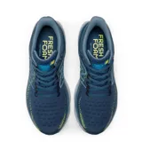 Championes de running New Balance Fresh Foam 1080 V12, color azul con detalles en amarillo y celeste.
