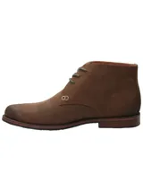 Botín de cuero engrasado color marrón, con cordones y suela de goma.
