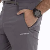 Pantalón largo desmontable color gris, con cinturón ajustable, bolsillos laterales y traseros con cierre.