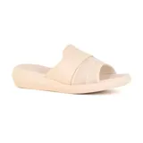 Sandalia de cuero color nude, con diseño moderno y tiras entrecruzadas para mayor comodidad.
