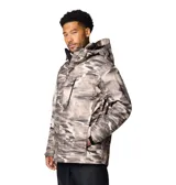 Campera Columbia Whirlibird V para hombre, con estampado camuflado en tonos beige y gris. Cuenta con tecnología Omni-Tech™ impermeable y transpirable, forro termorreflectante Omni-Heat™ y aislamiento Thermarator™.