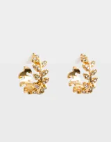 Aros argollas doradas con forma de hojas y strass incrustados.