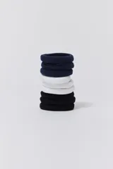Pack de nueve gomitas de pelo elásticas, tres de color azul marino, tres de color blanco y tres de color negro.