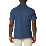 Polo de hombre Columbia Tech Trail, color blanco, de manga corta, con logo bordado en el pecho. Confeccionada en tejido hidroabsorbente Omni-Wick™ con elastano.