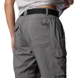 Pantalón de senderismo convertible en short, color negro, con tecnología Omni-Shade™ de protección solar UPF 50 y Omni-Wick™ de secado rápido. Cuenta con cintura parcialmente elástica, cinturón extraíble, bolsillos para manos, bolsillo de seguridad con cremallera, bolsillo cargo con cierre de velcro y detalle de fuelle.