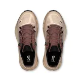 Championes de running color beige con detalles en marrón.