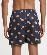 Calzoncillo tipo bóxer de tela color azul marino, con estampado de carpinchos en tonos marrones y puntos blancos. Tiene cintura elástica con la marca "Viko" en el centro.