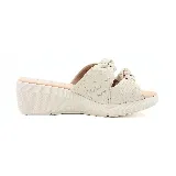 Sandalias de plataforma color beige con detalle de nudo en la tira delantera.