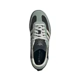 Championes Adidas Samba Og W, color negro con detalles en verde y beige.