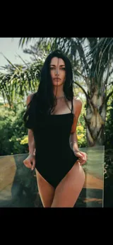 Body negro strapless de algodón.