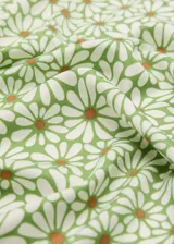 Pañuelo cuadrado con estampado de microflores y borde verde.