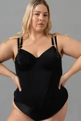 Corset negro con aro, confeccionado en LYCRA®, con ballenas en la delantera y breteles elásticos regulables.