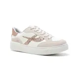 Championes blancos con detalles en rosa y glitter, con logo en forma de rayo en el lateral.