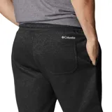 Short deportivo azul marino de algodón y elastano, con cintura elástica ajustable con cordón, bolsillos laterales y traseros, y logo de Columbia estampado en blanco en la pierna izquierda.
