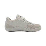 Zapatillas urbanas Paddock Extremes color beige, con suela texturizada y cordones.