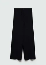 Pantalón negro de tejido de punto calado con cintura elástica y corte recto.