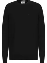 Sweater de lana merino 100% certificado, color negro, con corte regular y cuello redondo.