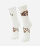 Medias de caña alta color blanco con estampado del personaje Tow Mater de la película Cars.