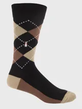 Calcetines de vestir para hombre, largo medio, con diseño de rombos (argyle) en colores negro, marrón y beige, con un pequeño logo de perro (Hush Puppies) bordado en el tobillo.