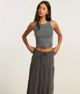 Pollera evasé new midi de algodón color gris, con volados y lazo en la cintura.