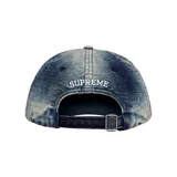 Gorra de béisbol Supreme modelo Cordura Denim S Logo, color azul denim con logo "S" bordado en blanco en el frente.