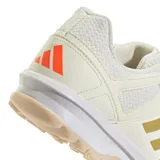 Championes Adidas Fabela Rise para hockey, color blanco con detalles dorados.