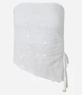 Top sin breteles de lentejuelas color blanco, con escote recto y lazo fruncido en el lateral.