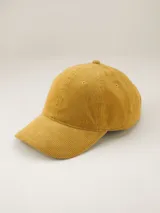 Gorra de béisbol azul de pana con visera curva y orificios de ventilación bordados.