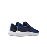 Championes Reebok Lux Running para hombre, color azul marino con detalles en azul eléctrico y suela blanca. Zapatillas versátiles para correr, caminar o uso diario. Parte superior sintética y textil con cierre de cordones.
