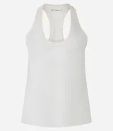 Musculosa deportiva de tule color crudo, con escote redondo y espalda nadadora. Presenta encaje en los laterales.