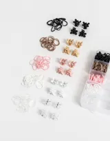 Set de accesorios para el pelo que incluye 150 gomitas de silicona y 20 mini broches de diferentes colores: negro, rosa, blanco, transparente y plateado.