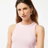 Camiseta sin mangas rosa de tejido de punto acanalado, con cuello redondo y sisas amplias.