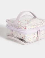 Neceser transparente con estampado floral, con manija superior y doble cierre.